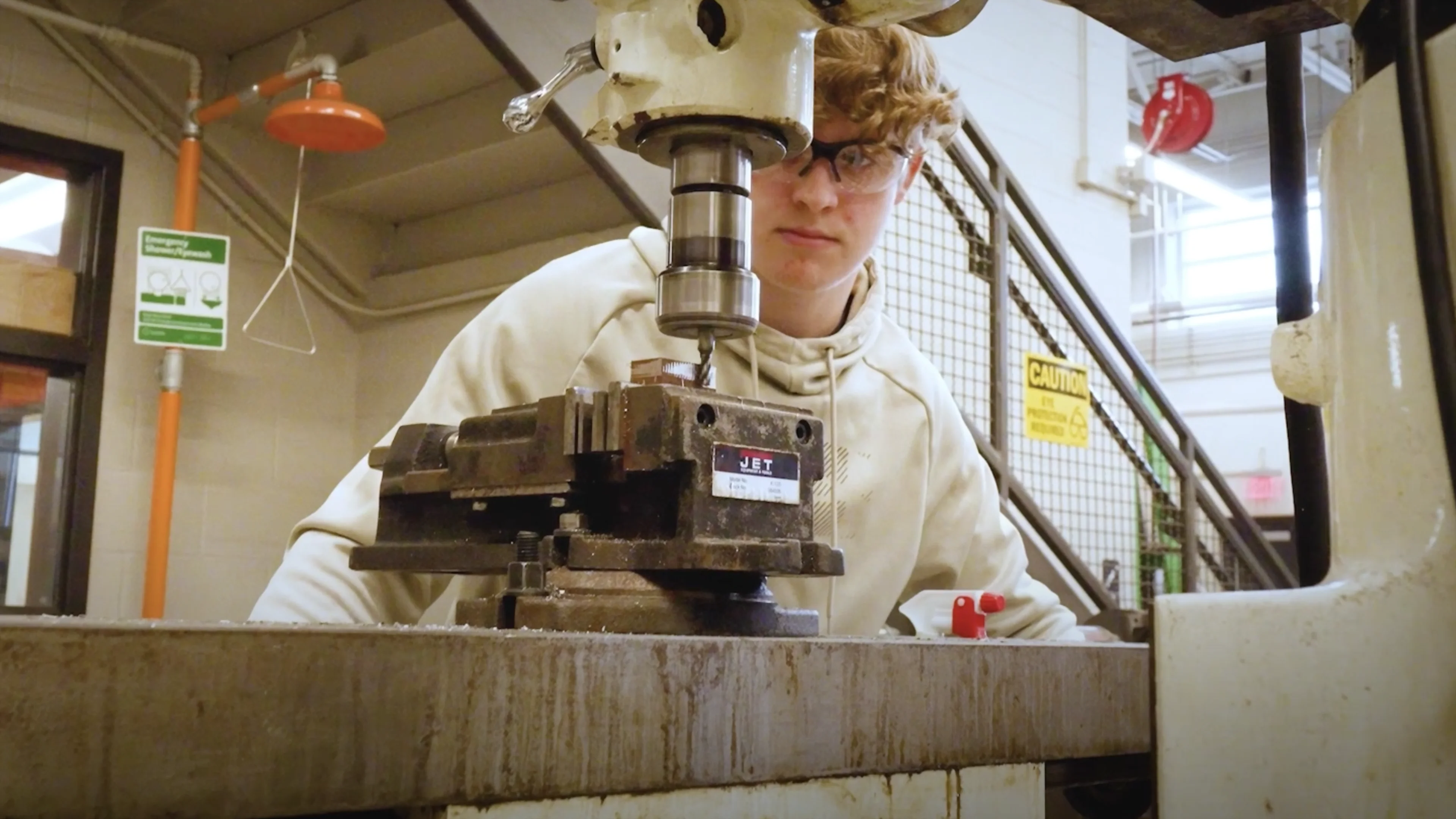 Student using engineering equipment