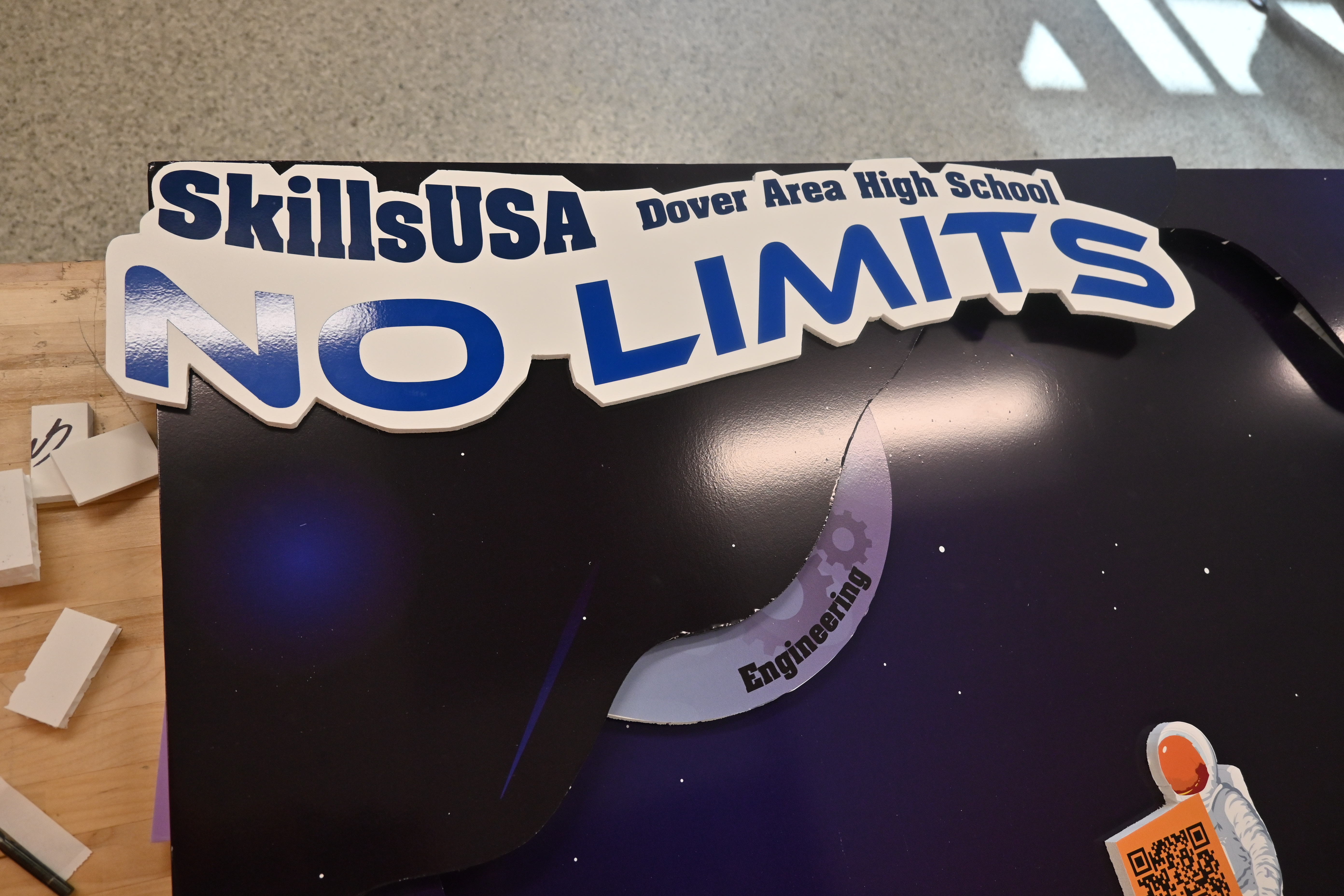 NO LIMITS sign on the bulletin board.